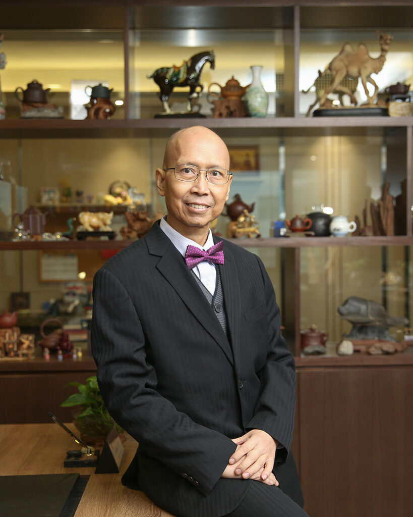 MR. SHER Hing-Shum A pioneering force in the rubber industry, Mr. Sher Hing Shum, exudes expertise and determination in his profile photo, symbolizing his influential role as a leader.